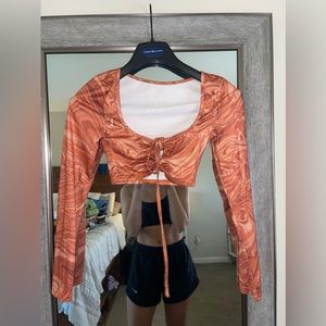 orange groovy top